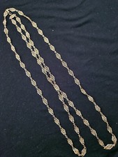 Long sautoir ancien filigrané en or 18K. 65 mailles filigranés. longueur 152 cm