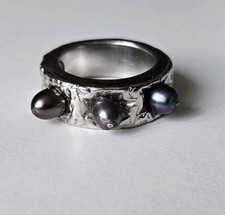 Très belle bague Christian Lacroix en argent avec 3 perles noires de Tahiti