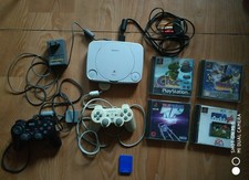 Console PsOne avec 4 jeux et 2