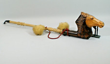 BRIQUET EN FORME DE PIPE