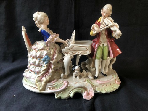 Figurine porcelaine - en,