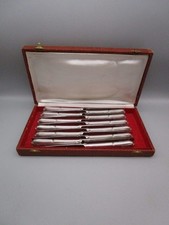 12 couteaux a fromage anciens en métal argenté en écrin