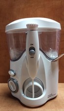 Jet dentaire Waterpik WP100 ULTRA retour client état neuf mais tuyau percé