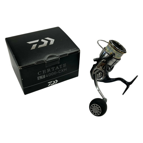 Daiwa moulinet tambour - À,