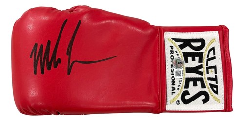 Mike tyson signed - left, hand
