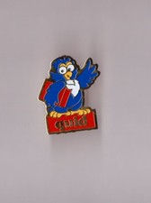 pin's livre Quid (signé Démons et merveilles Robert Laffont) hauteur: 3,1 cm