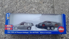 SIKU 2544 PORSCHE CAYENNE AVEC REMORQUE PORTE VOITURE + CARRERA GT 1/55