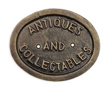 Une plaque en fonte « antiquités et objets de collection » réplique design rétro