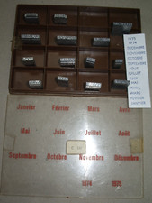 Caractères de dorure pour dorure au balancier, les 12 mois et les 31 chiffres