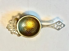 Passoire à thé ancienne