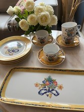 4 tasses à thé, 4 assiettes, un plat à cake Bernardaud modèle Borghese