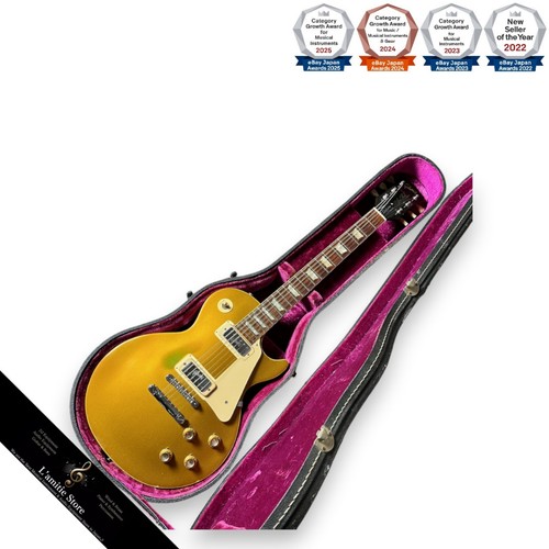 Gibson les paul deluxe gold - gibson,