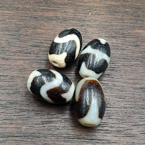 Lot perles dents - 4, tigre