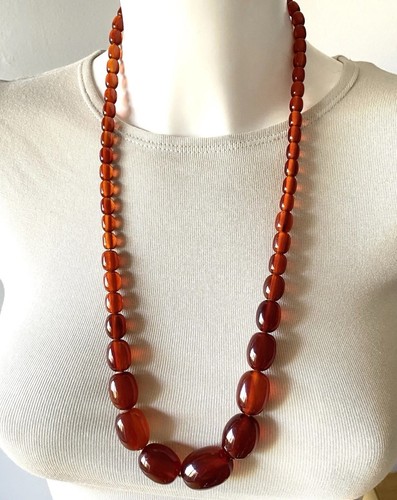 Collier perle bakelite - 69,