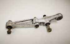 Bras de liaison d'amortisseur