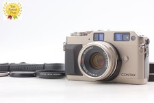 Comme neuf contax - comme, neuf]