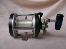 MOULINET DE PECHE " CAPERLAN ESSENTIAL GAME 20 LBS " SERVI UNE FOIS