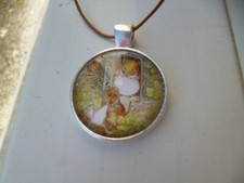 collier bronze cabochon sourie