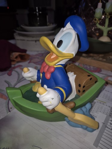 Tirelire donald en barque - donald,