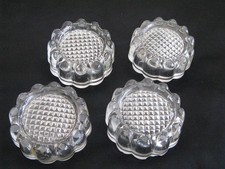 4 réhausseurs en verre moulé