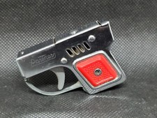 Ancien briquet à essence en forme de pistolet Partners vintage des Années 80