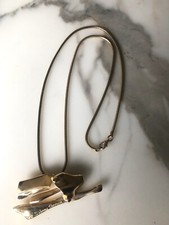 Collier pendentif moderniste