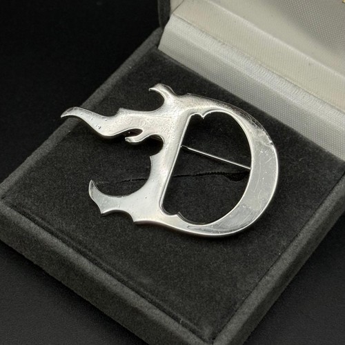 Broche christian dior logo feu - broche,