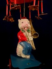 Ancien jouet cochon mécanique musicien trombone ombrelle années 40/50
