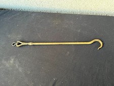 Ancien pique-feu en laiton – accessoire de cheminée XIXe