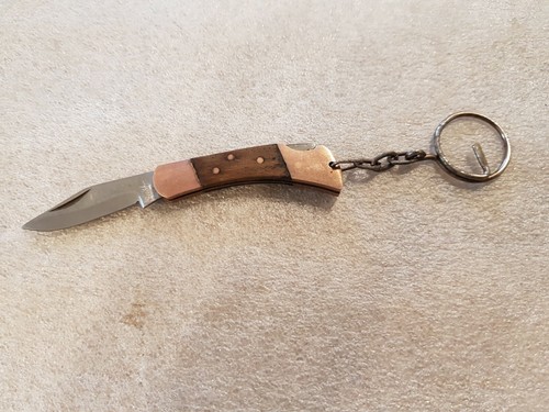 Porte clés couteau pliant - porte,