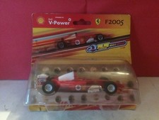 SHELL SUPERBE FERRARI F2005 1/38 NEUF SOUS BLISTER S5