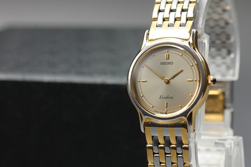 Montre femme ronde grise