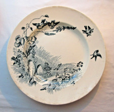 Grand plat rond plat signé