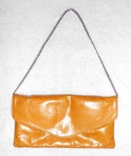 CAROLL sac pochette cuir ocre