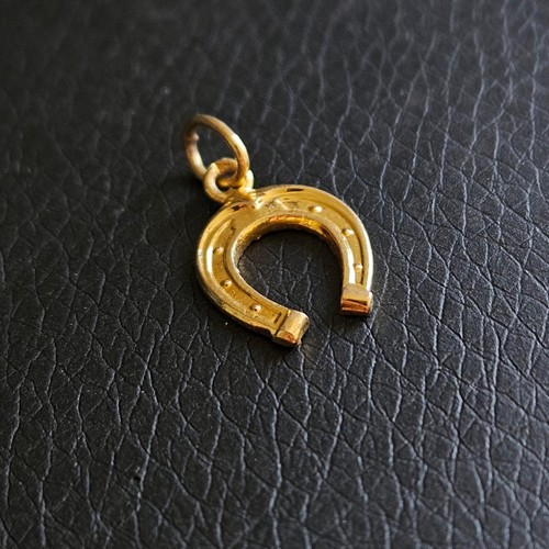 Pendentif porte bonheur fer - , à
