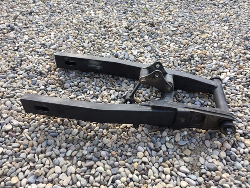 Bras oscillant patin - un, guide