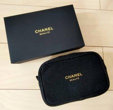 Pochette pochette maquillage cosmétique Chanel Beaute paillettes noir et or