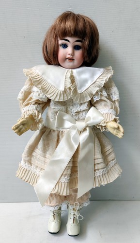 Poupee tete porcelaine marque - poupee,