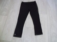 Legging LA MODE EST A VOUS noir et liserés coutures blancs taille 38 TBE