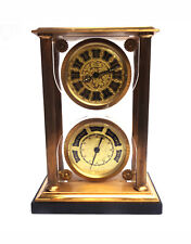 Pendule  8 jours  baromètre à colonne  Marque Suisse UTI. Remontage mécanique