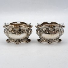 Paire de salerons en cristal et métal argenté de style Louis XV début XXème