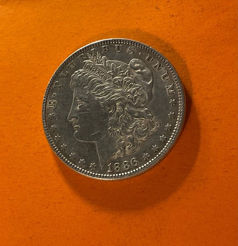 One dollar 1886 morgan - one,