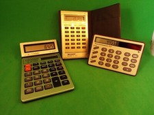 3 calculatrices vintages