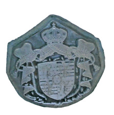 FER A DORER  METAL BLANC AVEC ARMOIRIES DE LA GRANDE DUCHESSE CHARLOTTE DE LUX.