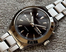 Rare montre SEIKO × ANA Kinetic Day-Date cadran bleu Triton, double logo, Japon