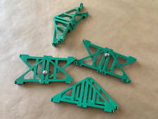 SCALEXTRIC 4 pairs ancien supports pour virage soulevé - années 60/70