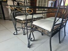 Vend table à manger en verre et fer forgé et ses 4 chaises