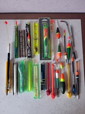 lot de bouchons/flotteurs et lignes de pêche.