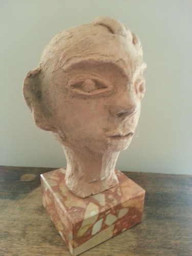 Sculpture tete terre cuite - terre,