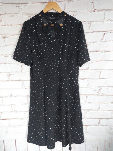 Taille robe voodoo - de,
